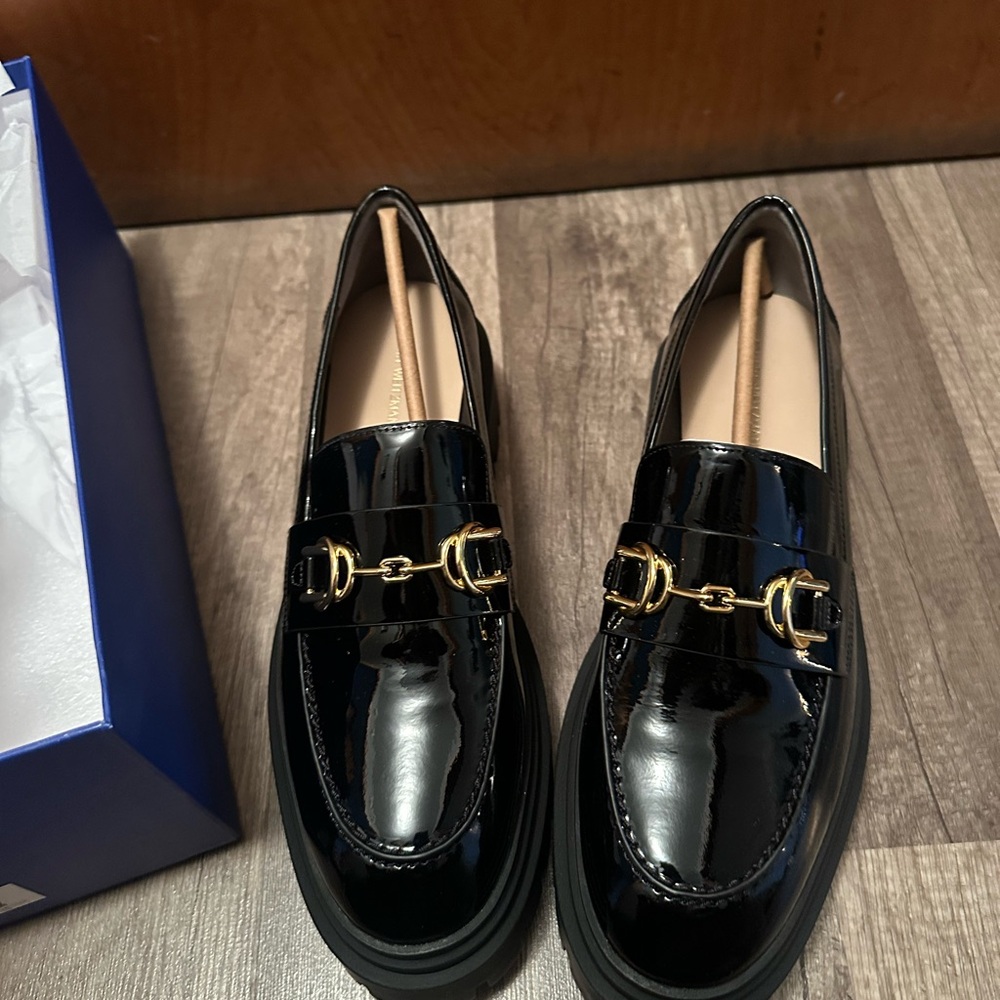 Stuart Weitzman Black Patent Leather Loafers with Gold Accents